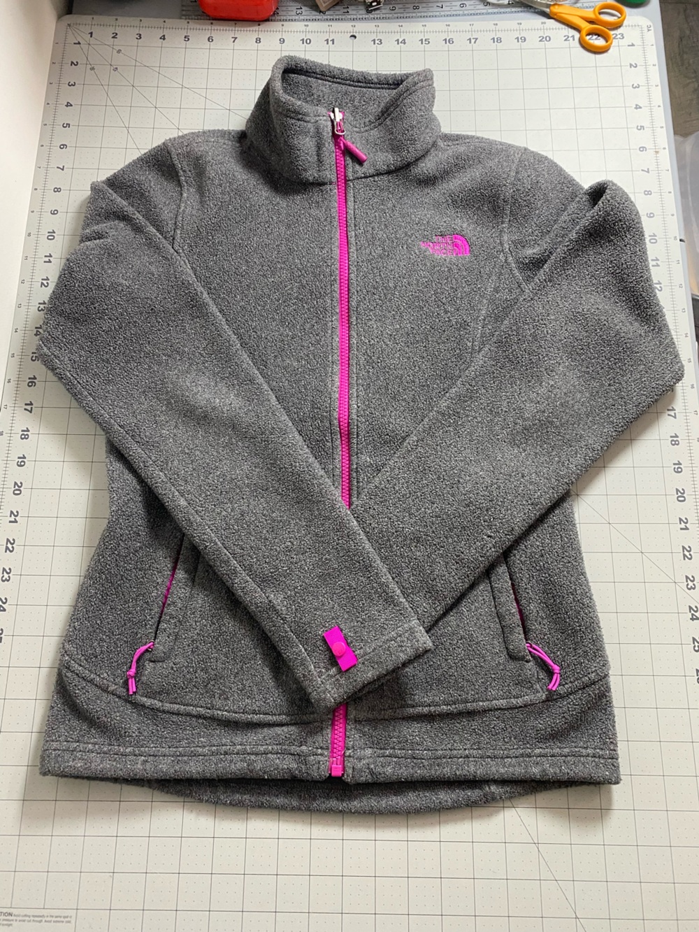 The North Face Women’s Gray Fleece Jacket with Pink Zippers